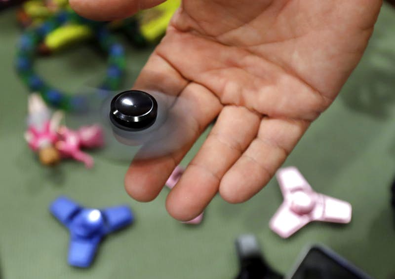 Fidget spinners named among possible summer hazards for kids